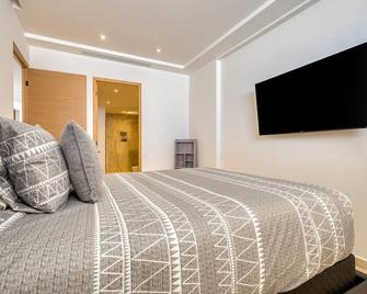 Charming Coastal Resort with ocean views, pool, gym and shared amenities - Cabo San Lucas - Habitación