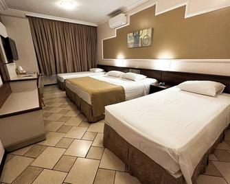 San Rafael Comfort Class Hotel - פוז דו איגוואסו - חדר שינה
