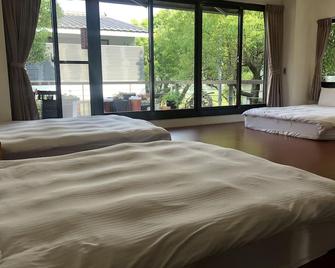 Sanyi Happiness B&B - Sanyi Township - Camera da letto