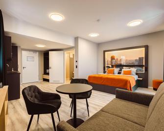 Juststay München Hotel & Apartments - Vaterstetten - Schlafzimmer