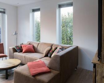 Cascara, Detached quiet cottage near beach - Baarland - Sala de estar