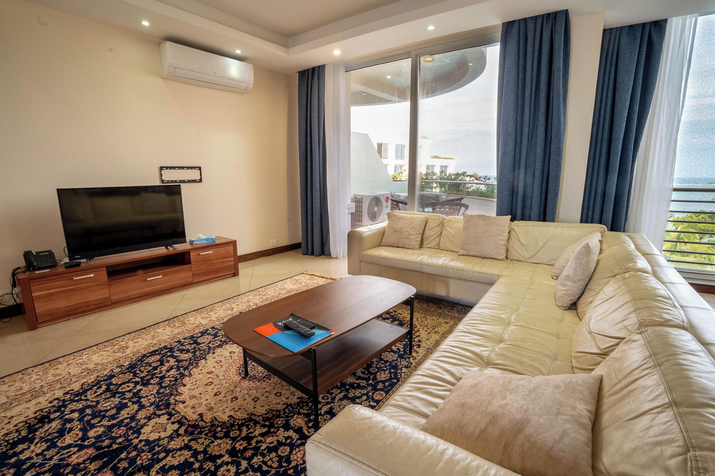 Kilua Beach Residences by CityBlue, Mombasa - Момбаса - Вітальня