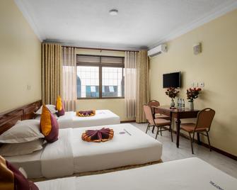 Holiday Express Hotel - Kampala - Schlafzimmer