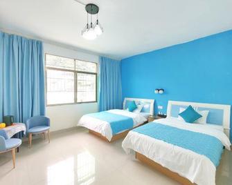 Huiyi Youth Hostel - Shaoguan - Camera da letto