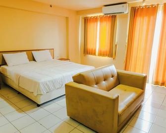 Apartemen Mutiara Bekasi by Alfa Rooms - Kota Bekasi - Kamar Tidur