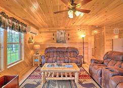 Rustic Benezette Cabin with Porch, Hot Tub and Fire Pit - Benezett - Living room