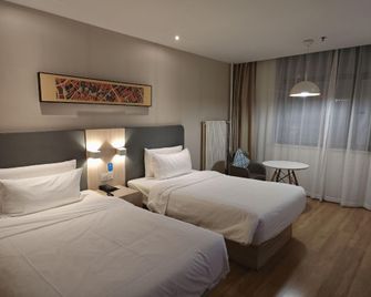 Hanting Express Xinxiang Pingyuan Road - Xinxiang - Slaapkamer