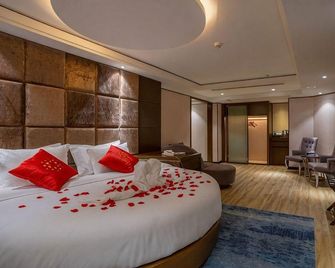Universal International Hotel - Zhanjiang - Slaapkamer