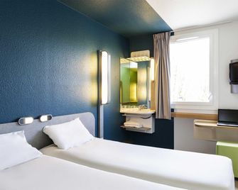 إيبيس بدجيت باريس بورت دو فينسين - باريس - غرفة نوم