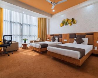 Hotel Aman Palace - Shahdol - Bedroom