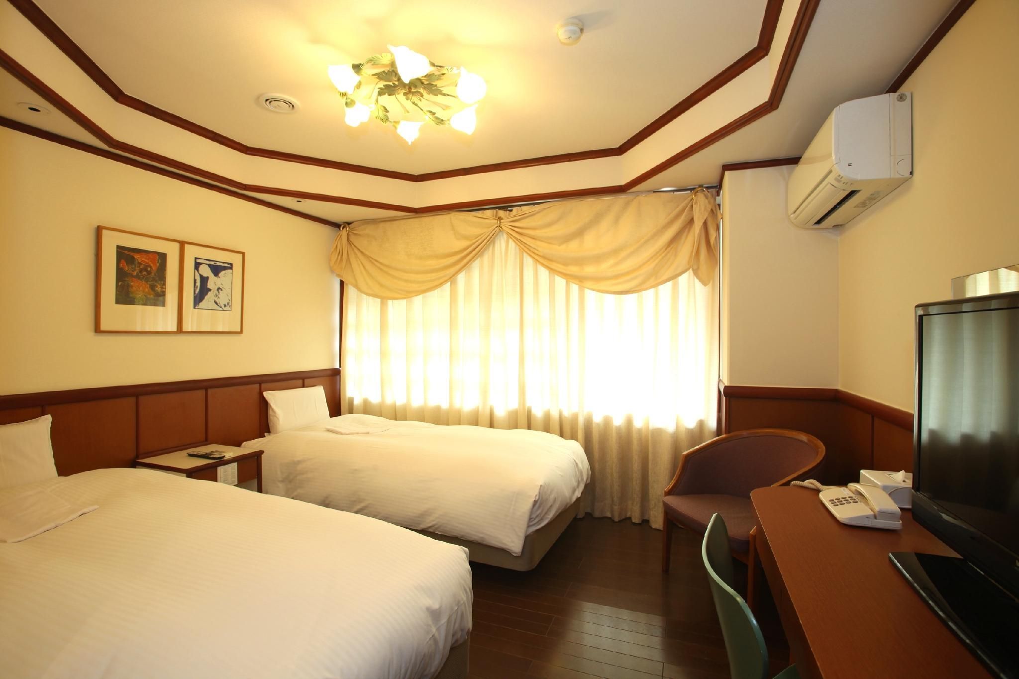 Hotel Ivory - Toyonaka - Schlafzimmer