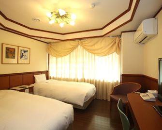 Hotel Ivory - Toyonaka - Slaapkamer