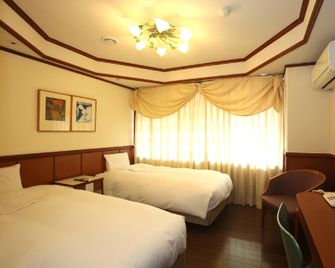 Hotel Ivory - Toyonaka - Schlafzimmer