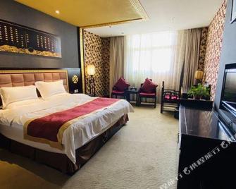 Xihuang Hotel - Zhoukou - Bedroom