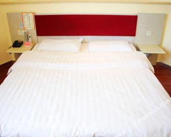 Jixi Hongjun Road Xi Long Hotel - Jixi - Habitación