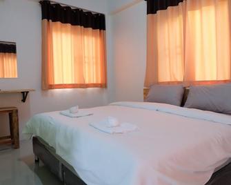 Rung Chiangrai Resort - צ'אנג ראי - חדר שינה