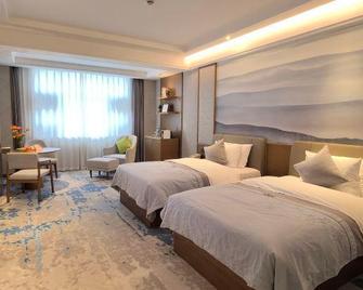 New Overseas Chinese Hotel - Zhoushan - Ložnice