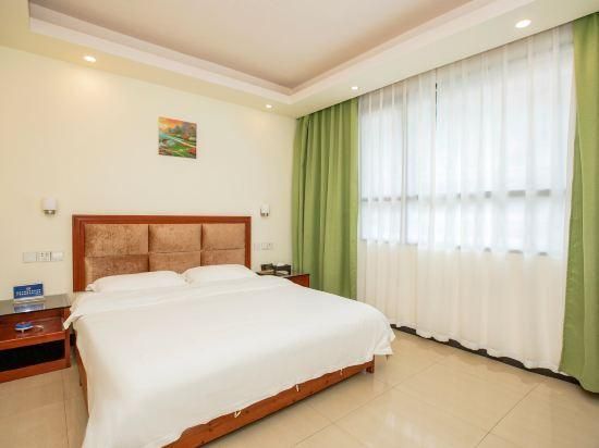 Yangshuo Xinyue Hotel - גילין - חדר שינה