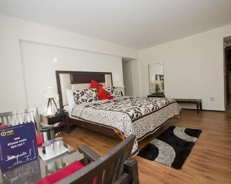 OYO 1619 Hotel Swiss Wood - Naggar - Bedroom