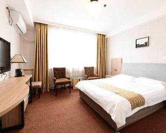 Yuanda Business Hotel - Harbin - Habitación