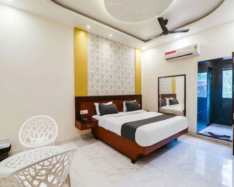 Hotel Dev International - Лакнау - Спальня