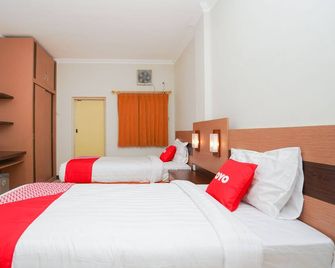 Hotel O Graha Marina - Surabaja - Ložnice