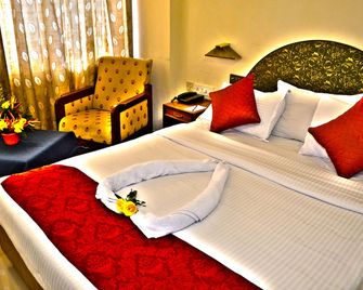 Hotel Pankaj - טריבאנדרום - חדר שינה