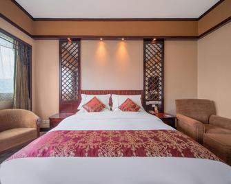 Nenghui Hotel - Guiyang - Habitación