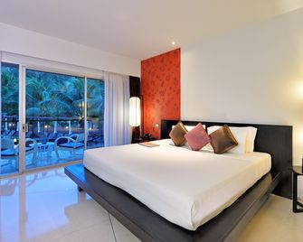 ريد جينجر تشيك ريزورت - كرابي - غرفة نوم