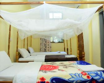 Patmos Hotel - Moshi - Schlafzimmer