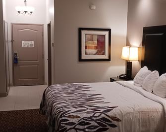 Red Roof Inn & Suites Longview - Longview - Slaapkamer