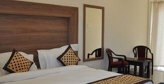Hotel Kss Inn - Dehradun - Bedroom