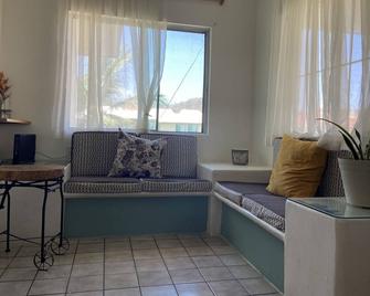 Apartment with pool 10 minutes from Playa Chahue - La Crucecita - Living room