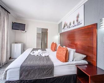 Khayalami Hotel - Mbombela - נלספרייט - חדר שינה