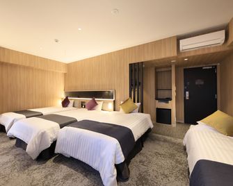 كوينتيسا هوتل فوكوكا تينجين كوميك آند بوكس - فوكوكا - غرفة نوم