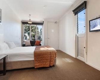 Smart Stayzzz Inns - Clermont - Bedroom