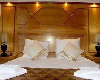 The Sandringham Bed & Breakfast and Self-Catering - אמהלאנגה - חדר שינה