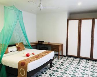 Tanna Evergreen Resort & Tours - Lénakel - Schlafzimmer