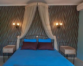 Ktima Garas - Paralia Panteleimonos - Slaapkamer