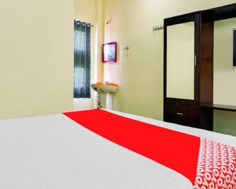 Hotel O Vishnu Lodge - Ellore - Bedroom