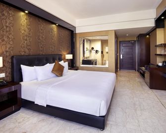 Grand Mercure Solo Baru - Surakarta - Schlafzimmer