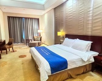 Wassim Hotel Nanjing Youth Olympic Sports Park - נאנז'ינג - חדר שינה