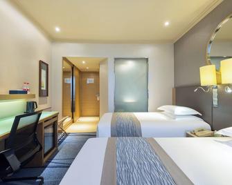 Ocean Hotel - גואנגג'ואו - חדר שינה