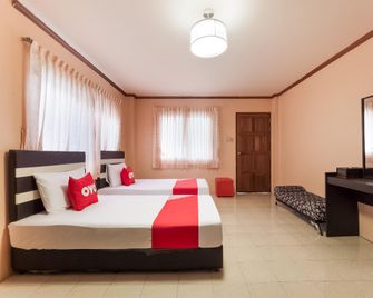 OYO 75370 Saowanee Resort And Apartment - Si Racha - Bedroom