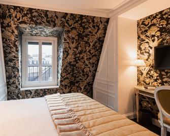 فندق بوشي من م ه - باريس - غرفة نوم