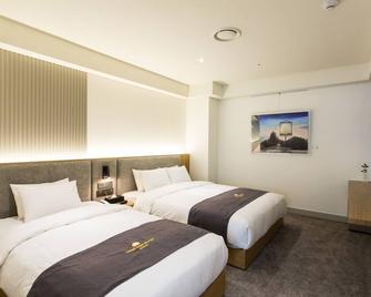 Hotel Inter Burgo Wonju - Wonju - Bedroom