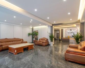 Ruli Jinwan Business Hotel - Xishuangbanna - Salónek