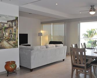 Beautiful!! Executive beachfront condo with Spectacular Ocean Views! - Bucerías - Living room