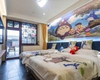 Guangxu Xinggong Inn - Jinzhong - Schlafzimmer