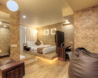 Hotel El Dorado - אחמדאבאד - חדר שינה